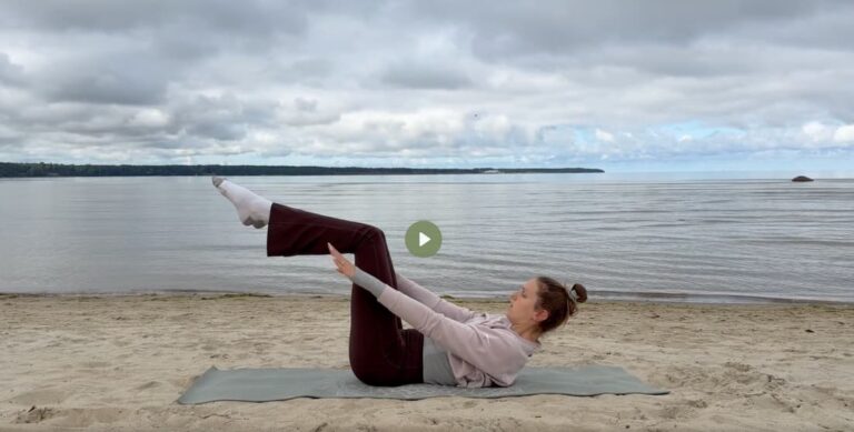 Abs Pilates workout at the beach