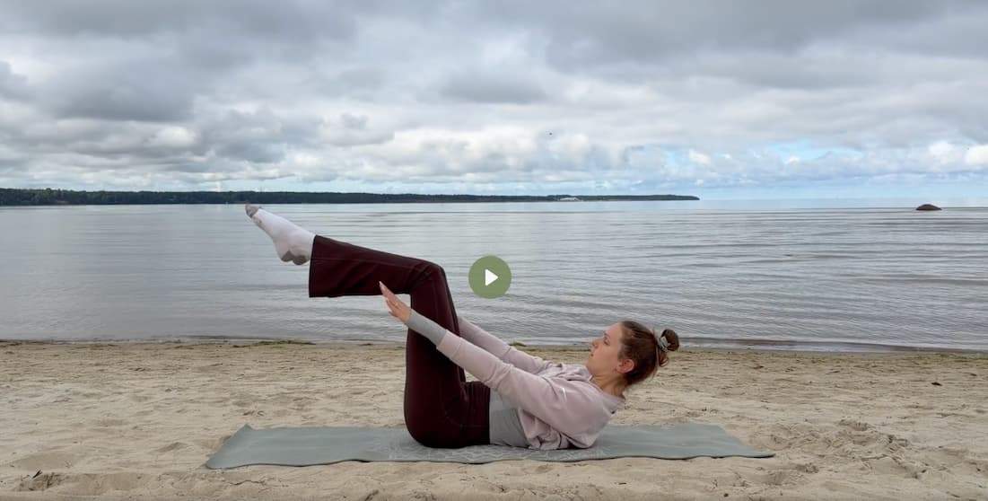 Abs Pilates workout at the beach