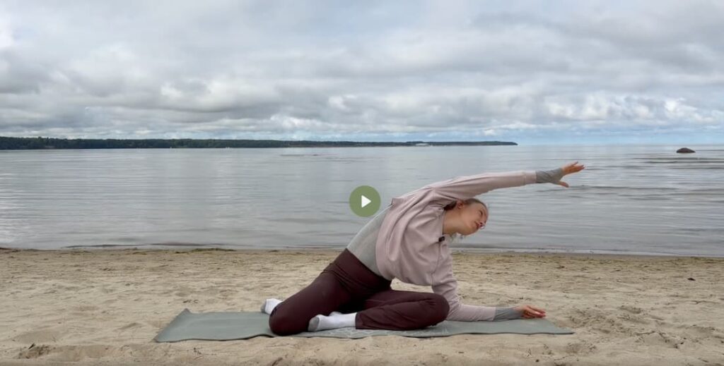 Improve posture with mermaid stretch at the beach