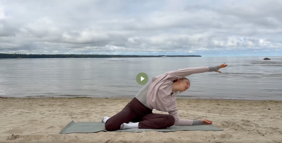 Improve posture with mermaid stretch at the beach